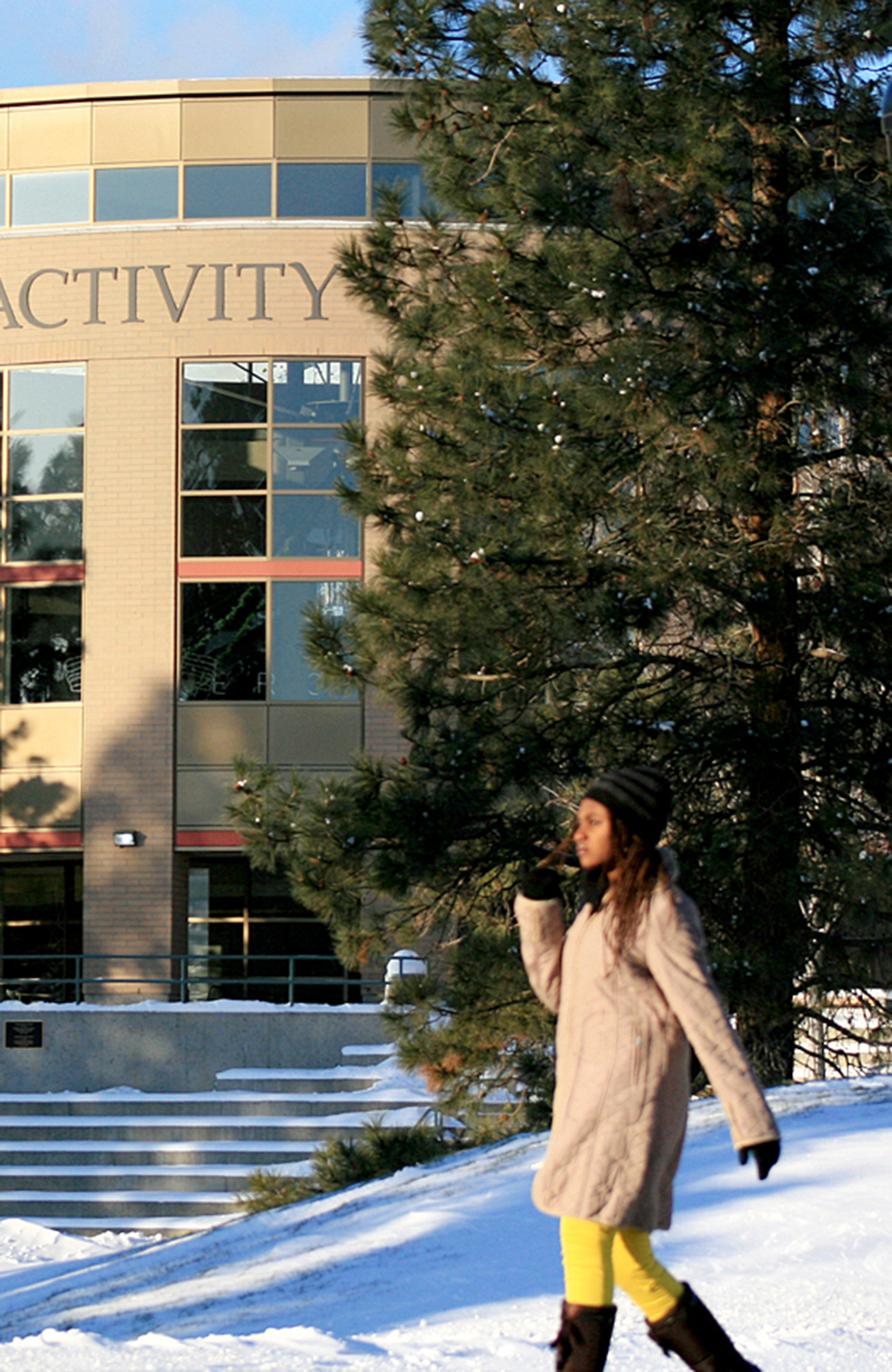 a woman on campus at Thompson Rivers University in the snow