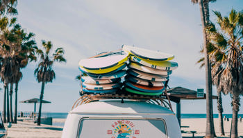 travel-inspiration-old-vw-car-with-surfboards-sidebar
