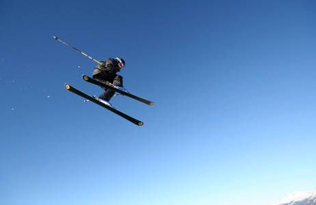 skiier flying up in the air in Canada near Kamloops