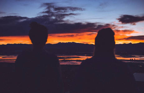 two students during sunset in new zealand