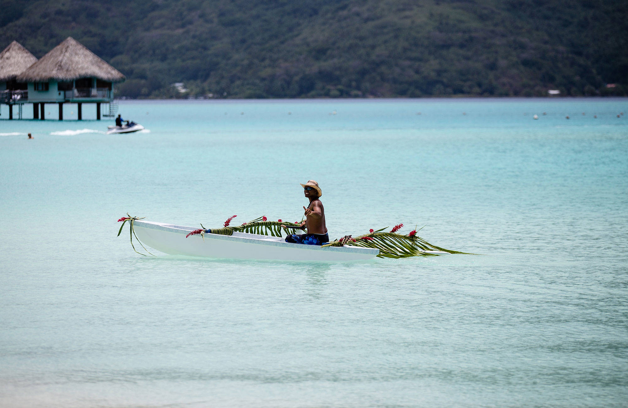 french-polynesia-man-sailing-in-boat