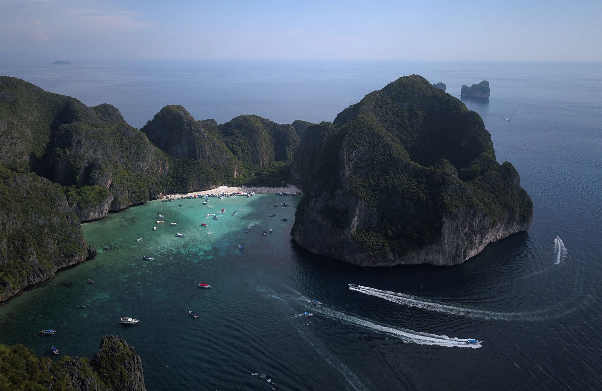 koh-phi-phi-maya-beach-aerial-boats-cliffs-sea-thailand-cover