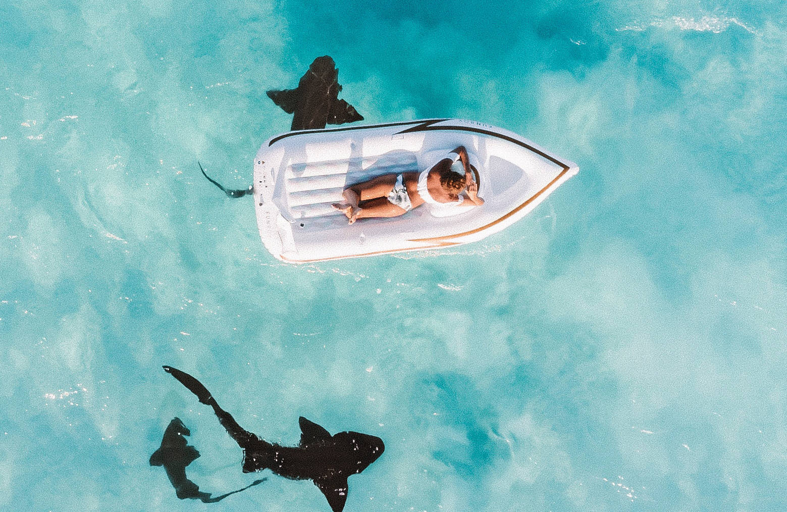 bahamas-woman-ocean-rays-cover