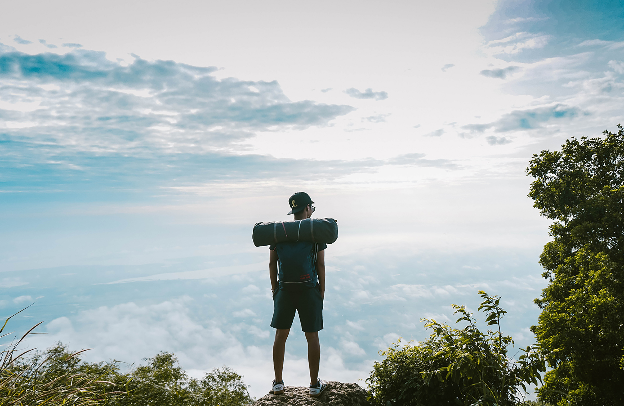 Backpacker standing on top of the mountain in Vietnam
