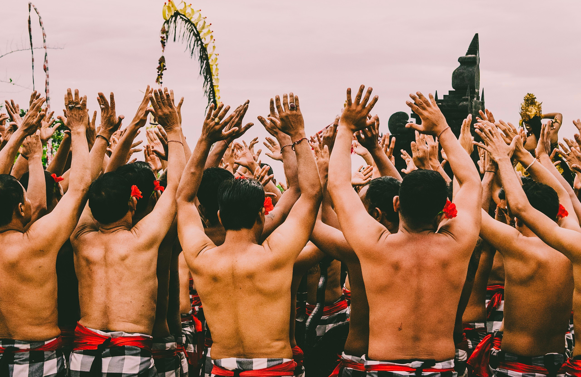 Men dancing during a cultural celebration on the island of Bali in Indonesia