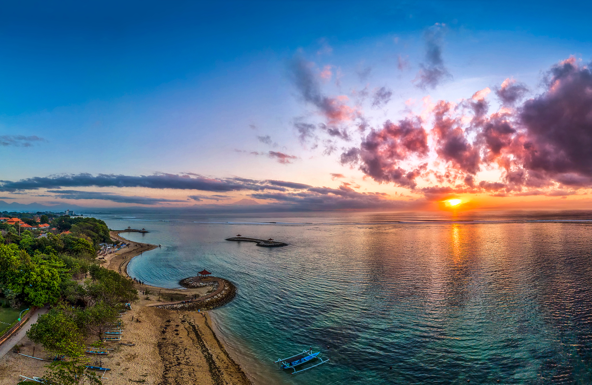 Beach during sunset in the town of Sanur on Bali, Indonesia