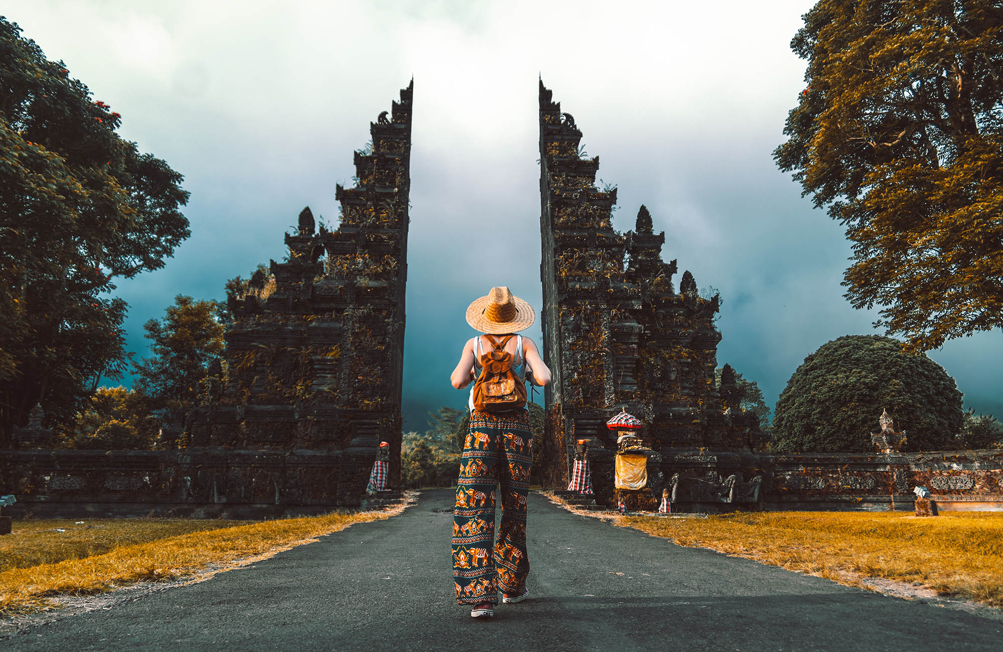 Female traveller in front of a Candi Bentar gate in Bedugul on Bali