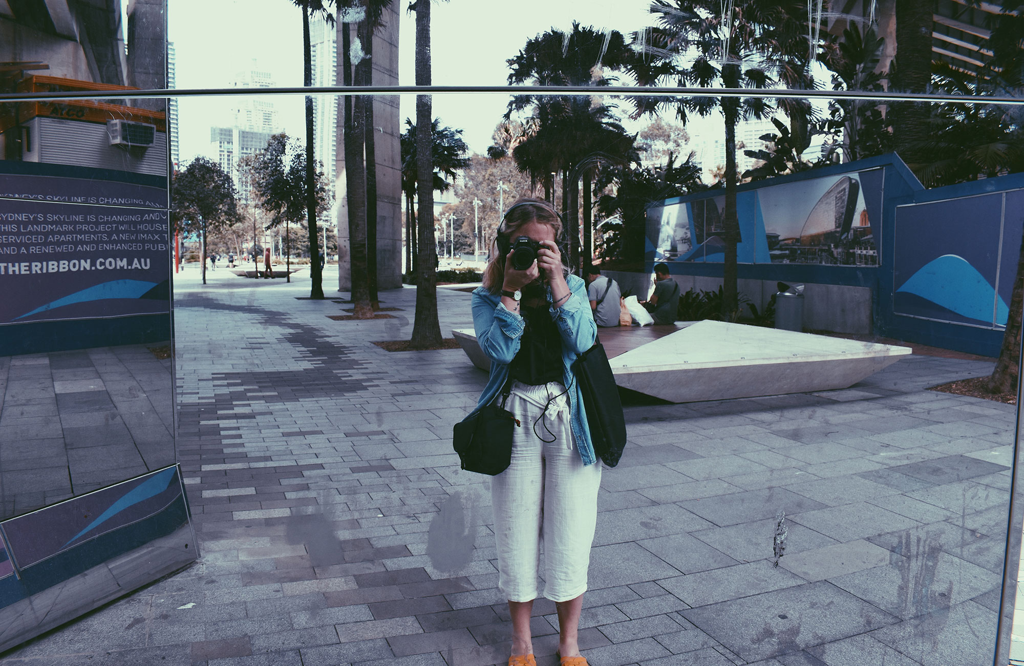 female international student at uts in Sydney taking a picture
