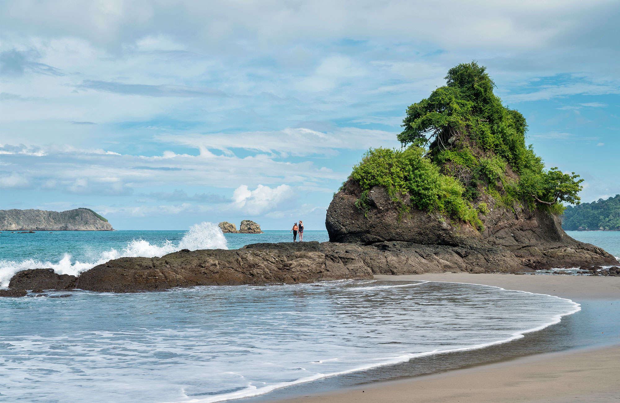 manuel-antonio-costa-rica-beach-and-two-persons-on-rock-cover