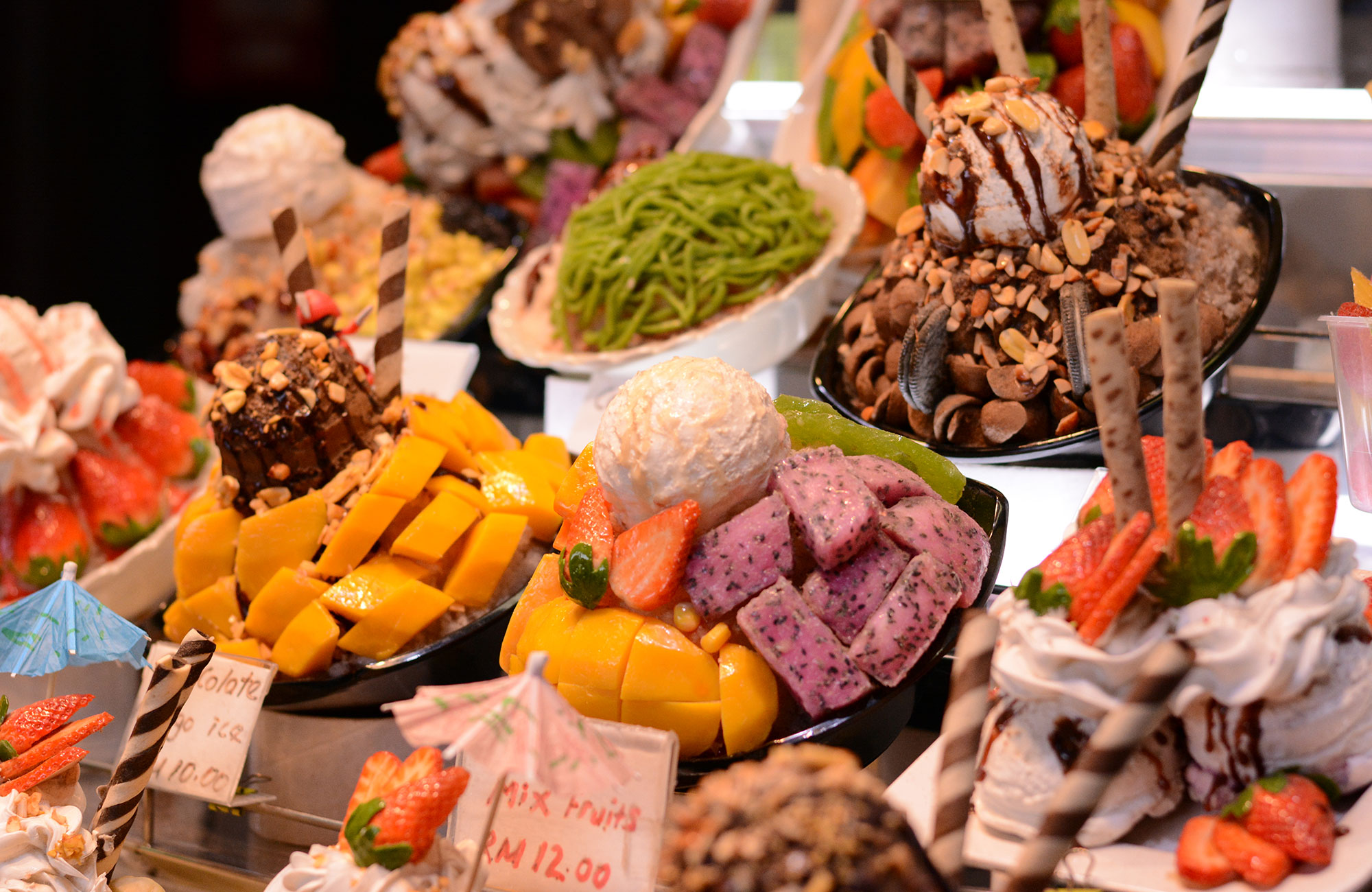 Selection of Malaysian deserts with lots of fruits, at low prices