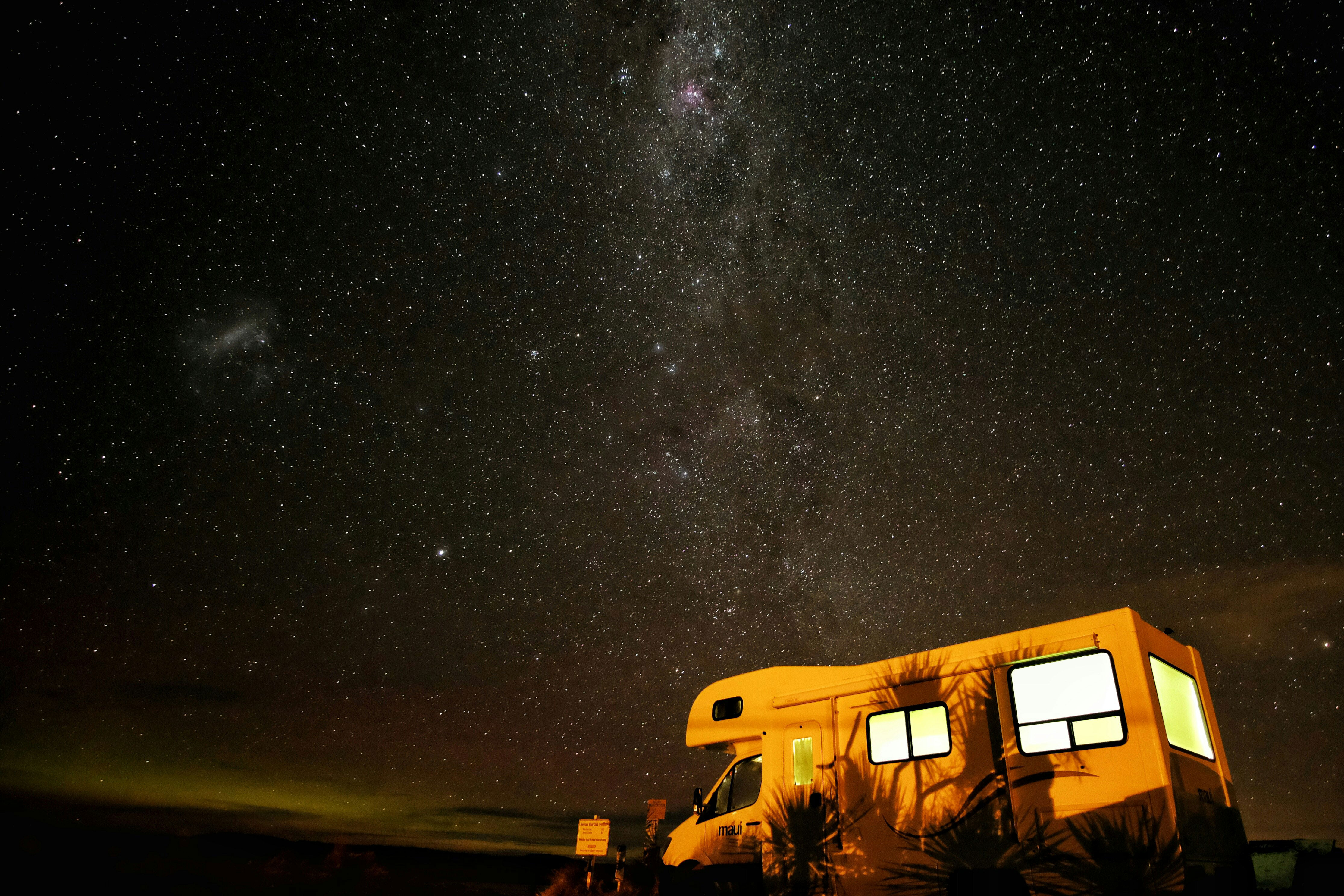 Campervan Under A Starry Sky In New Zealand