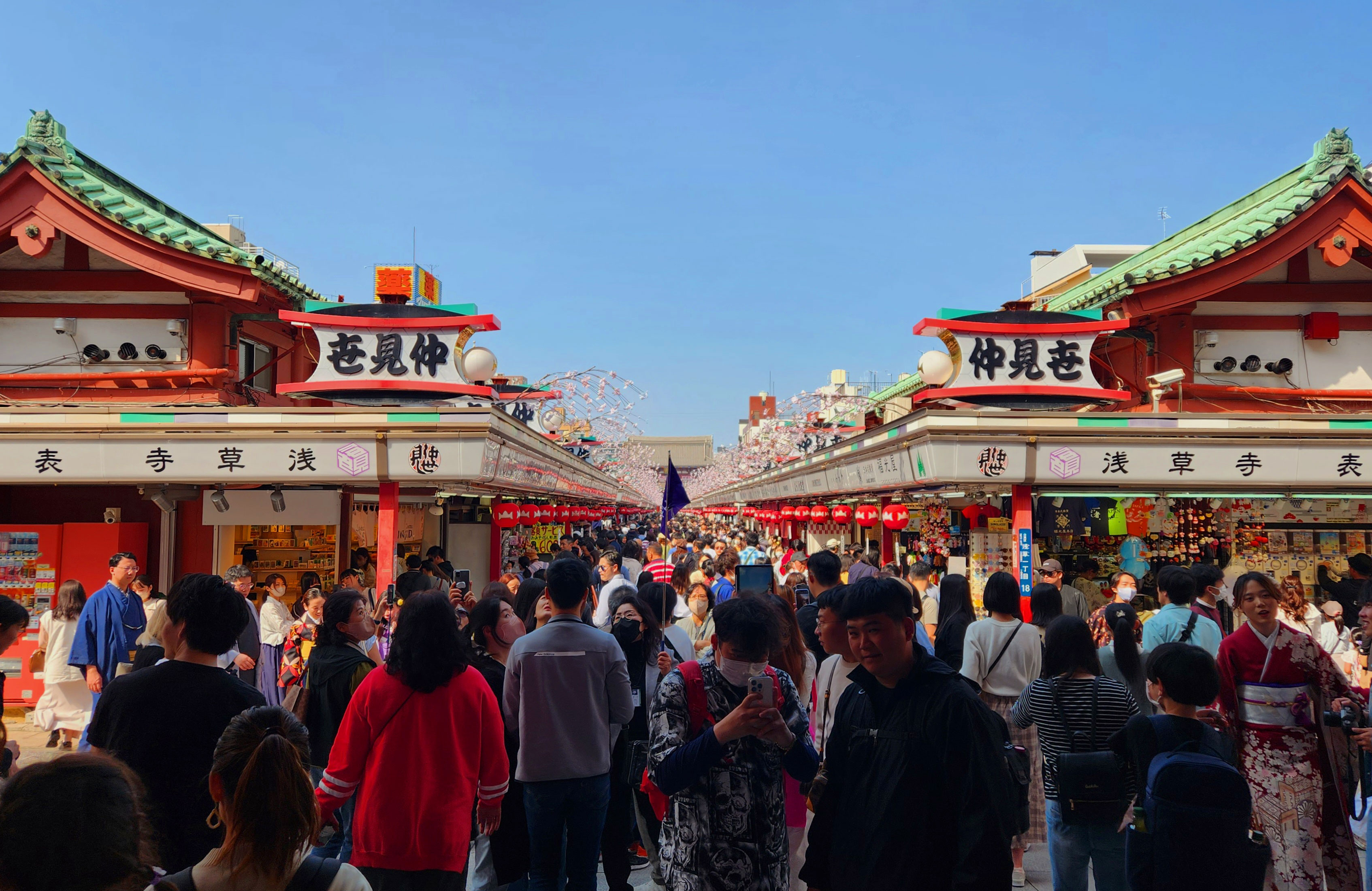 Masses of people at the food market near the famous Senso-Ji temple in Tokyo