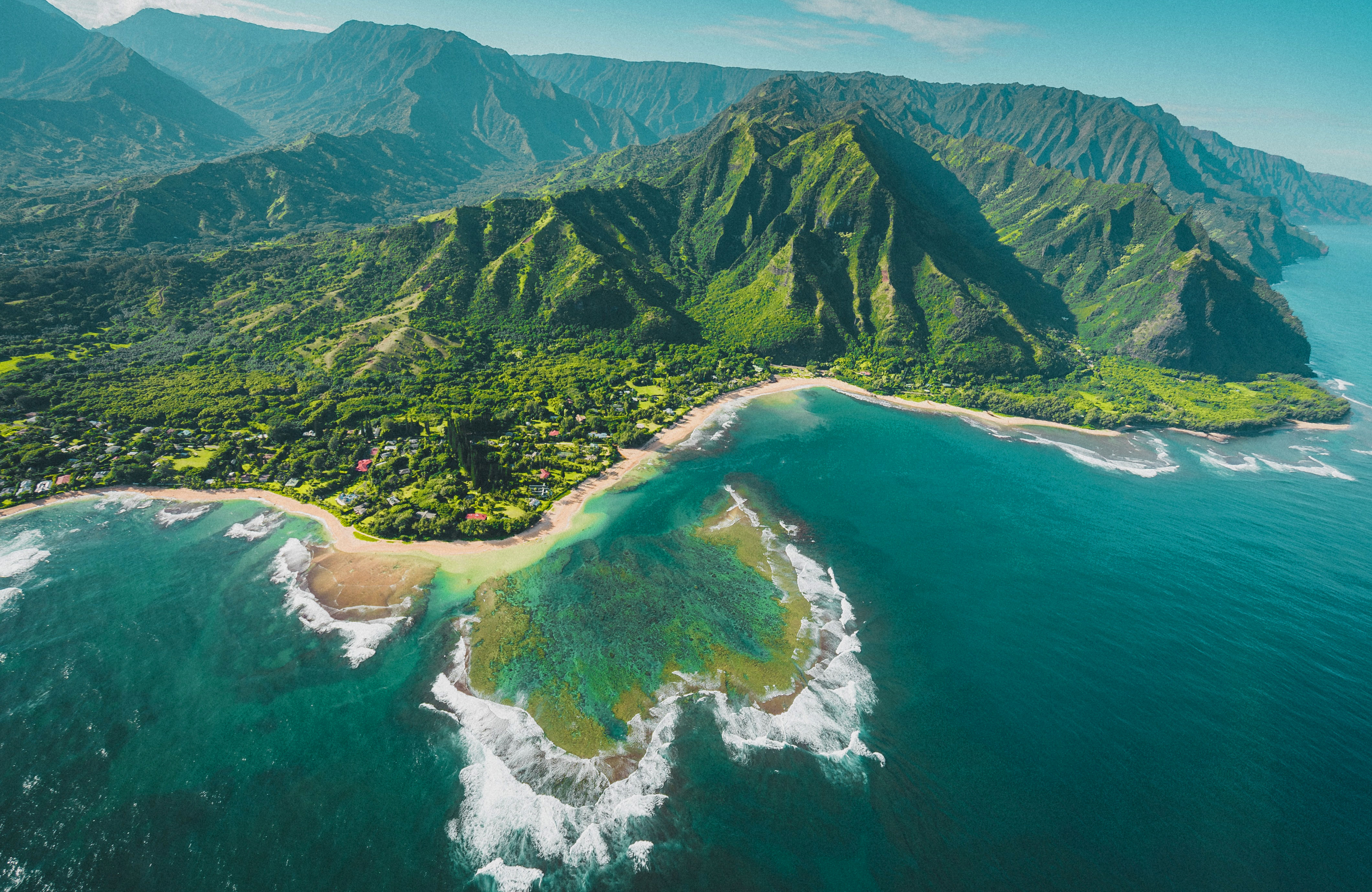 Aerial view over Kauai and its lush green mountains