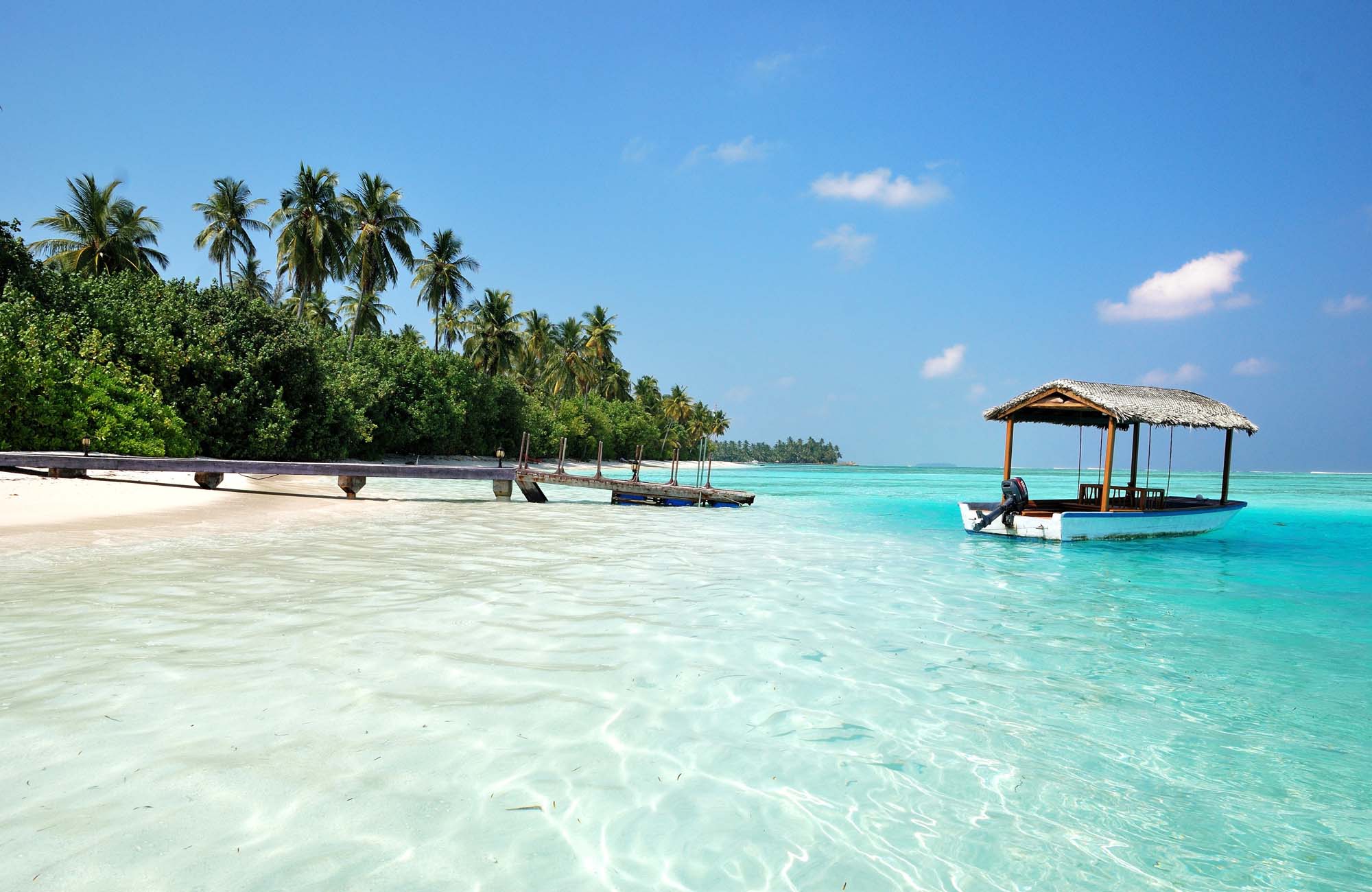 Boat-beach-maldives-cover