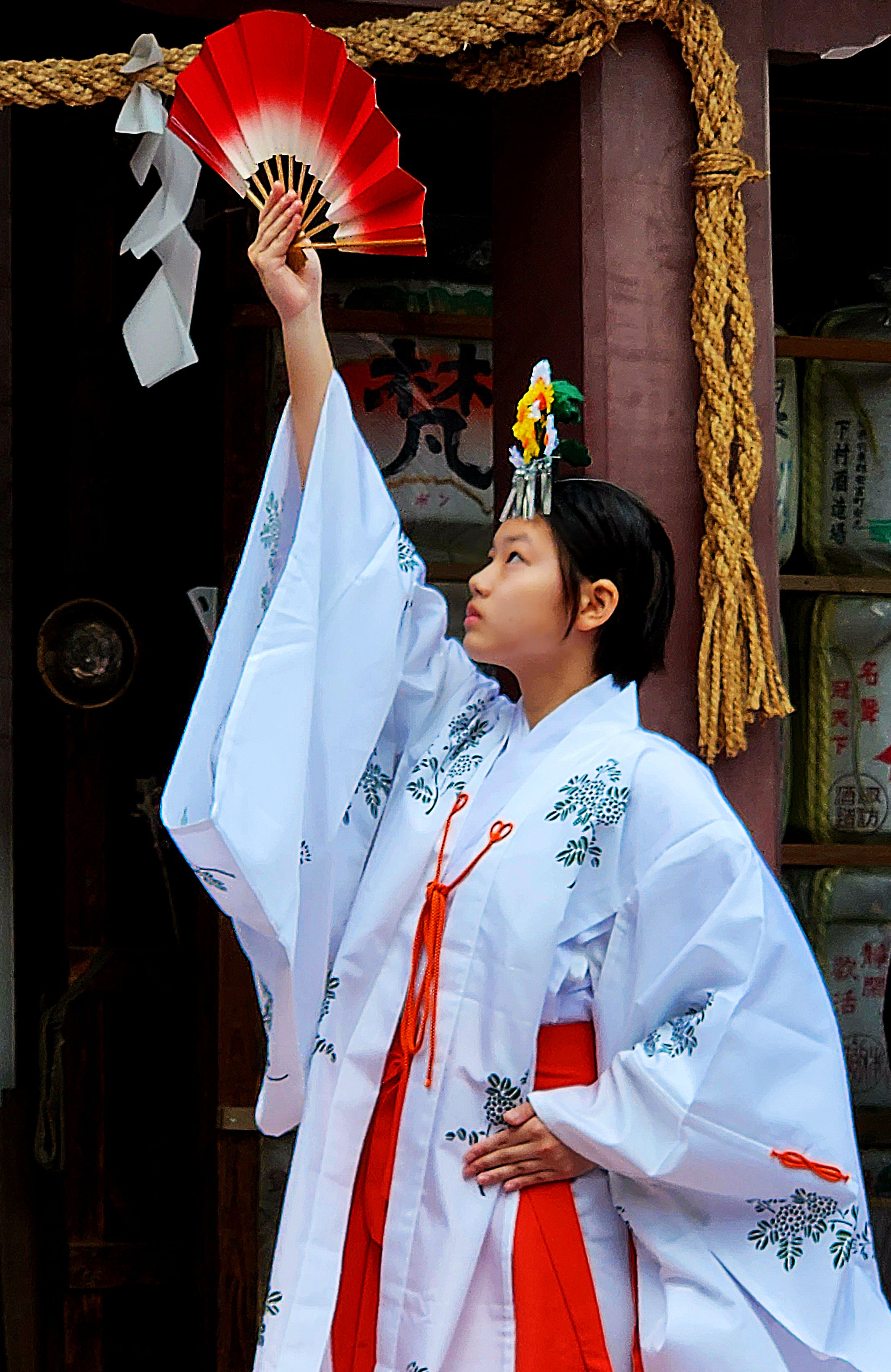 Girl performing the ceremony at the Kanamara Matsuri festival in Kawasaki
