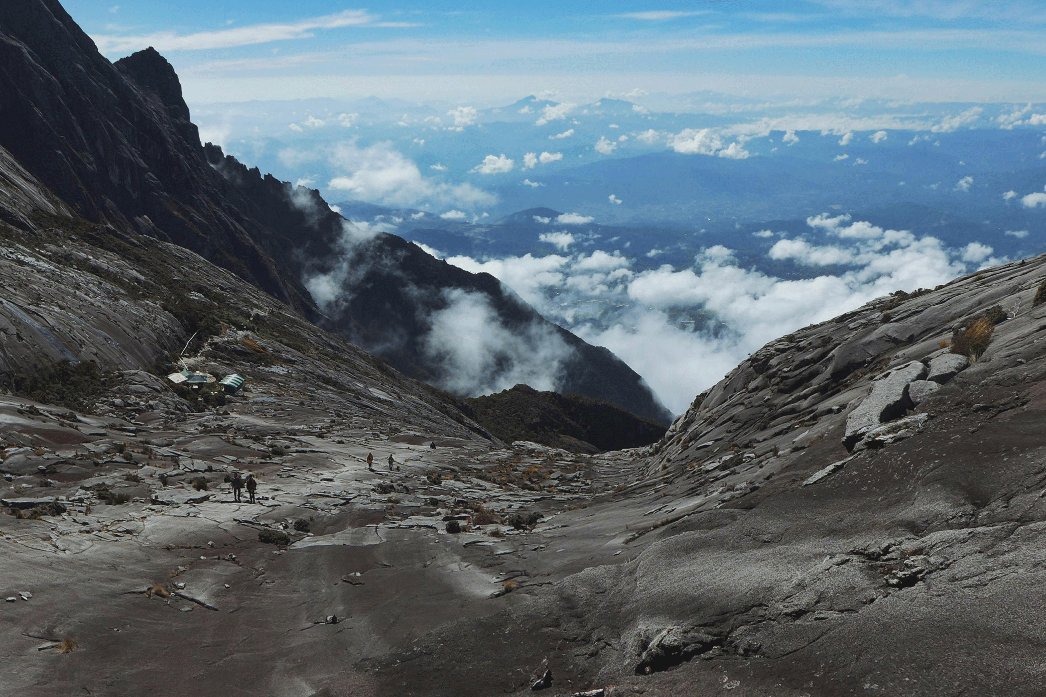 Trek up Kota Kinabalu in Malaysia, with a sunrise above the clouds