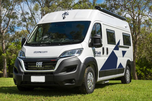 Star RV Polaris 2 campervan in white, in a grassy field. 