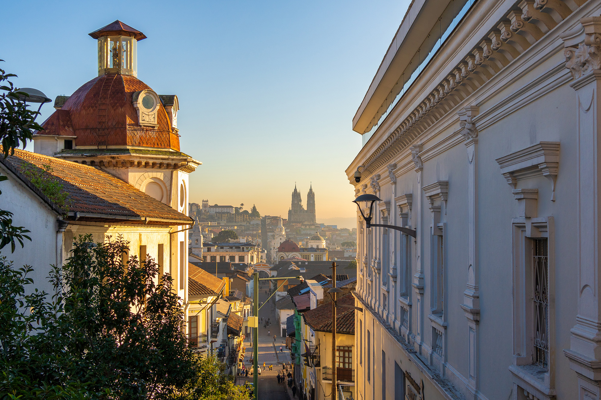 Historical colonial buildings in Quito with pretty sunset skies