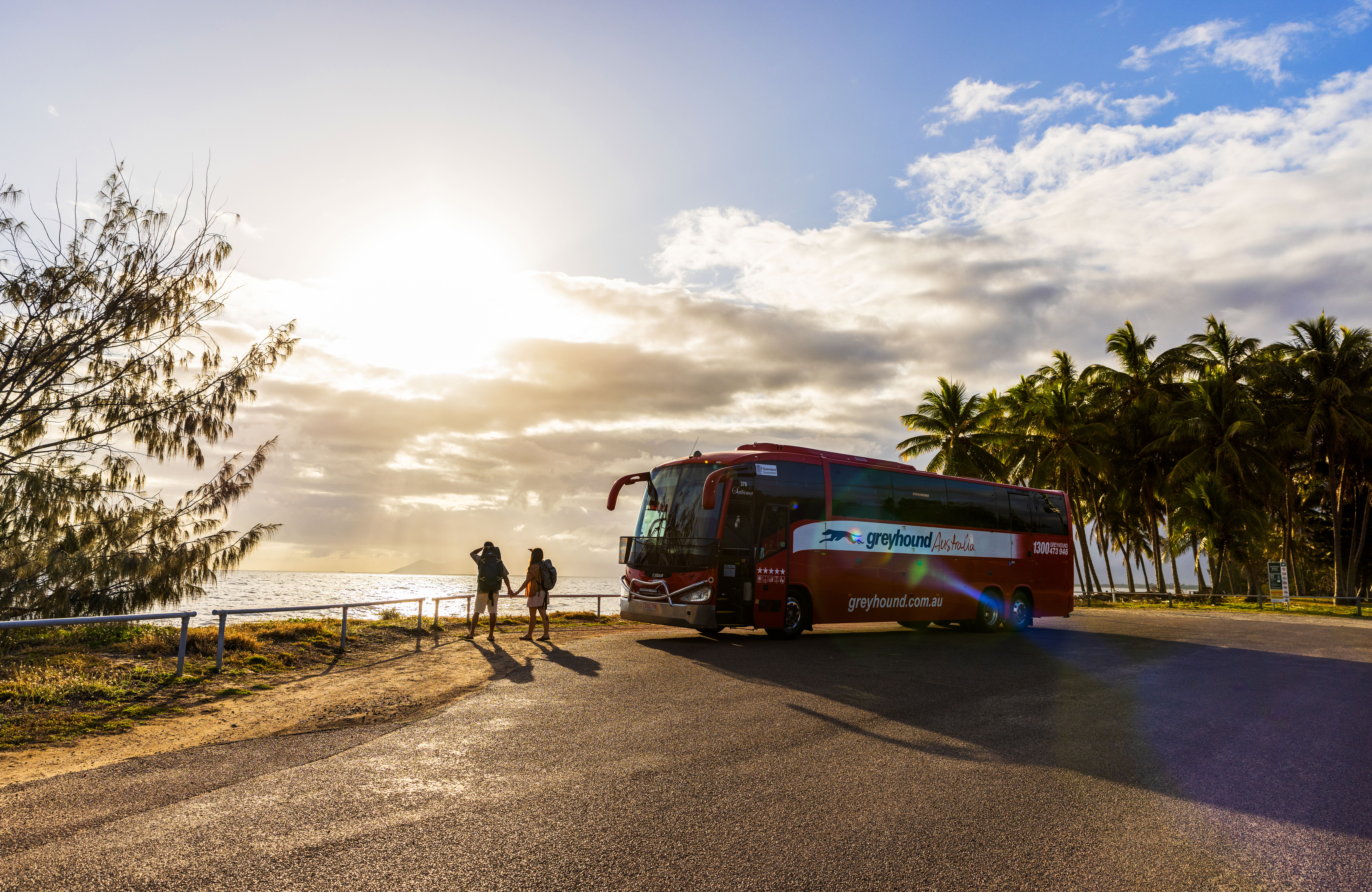 Greyhound bus making a stop by the ocean